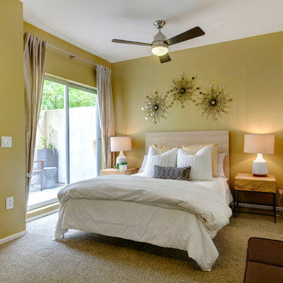 Bedroom - contemporary bedroom idea in San Diego with yellow walls