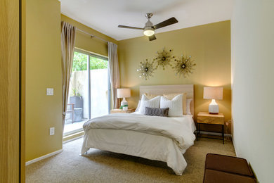 Bedroom - contemporary bedroom idea in San Diego with yellow walls