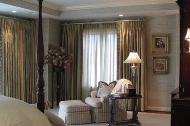 Mid-sized elegant master dark wood floor and brown floor bedroom photo in Wilmington with gray walls