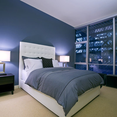 Example of a trendy bedroom design in Seattle with blue walls