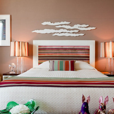 Trendy bedroom photo in New York with brown walls