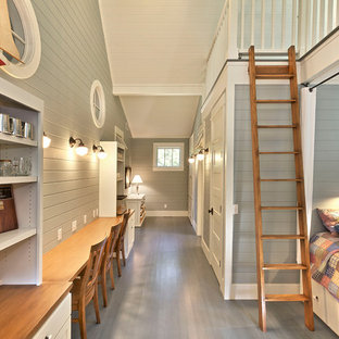 Bedroom - coastal painted wood floor bedroom idea in Other