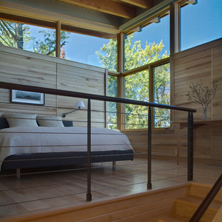 Inspiration for a small rustic loft-style light wood floor bedroom remodel in Seattle
