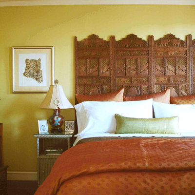Example of a bedroom design in San Francisco with yellow walls