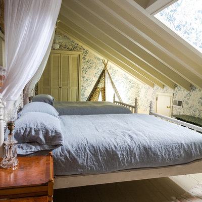 Bedroom - shabby-chic style guest painted wood floor bedroom idea in New Orleans with multicolored walls