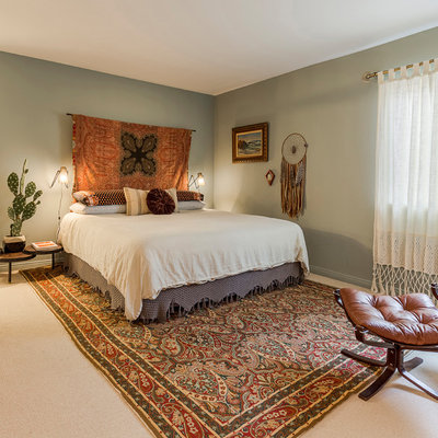Inspiration for a large eclectic master carpeted and beige floor bedroom remodel in Los Angeles with green walls and no fireplace