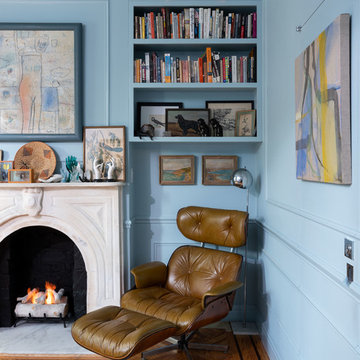 Eclectic Blue Master Bedroom with Marble Fireplace and Contemporary Art - Brookl