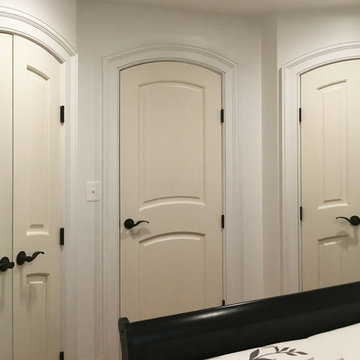 Elegant Arch 2-Panel Doors Painted White