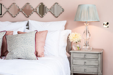 Country grey and pink bedroom in Sussex.