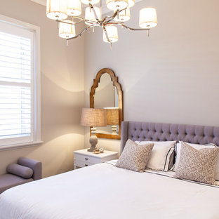 Traditional bedroom in Melbourne with beige walls.