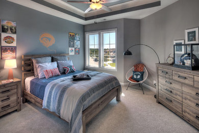 Example of a transitional carpeted and beige floor bedroom design in Kansas City with gray walls