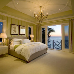 Inspiration for a large modern guest carpeted bedroom remodel in Miami with green walls and no fireplace