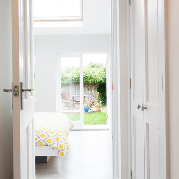 Extension, view from hallway to bedroom with double doors to garden