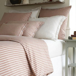 Inspiration for a small country guest carpeted bedroom remodel in New York with white walls
