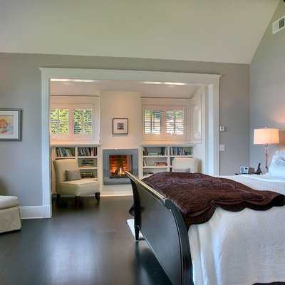 Bedroom - contemporary dark wood floor bedroom idea in Seattle with gray walls