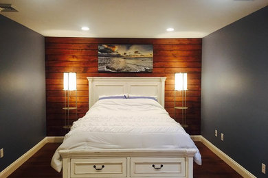 Example of a transitional bedroom design in Boston
