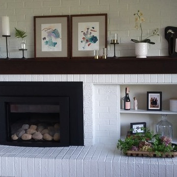 Fireplace mantle and surround with display shelves