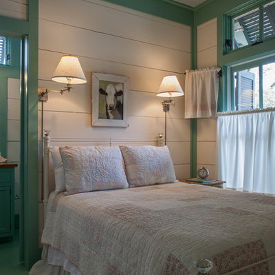 Example of a beach style bedroom design in Miami with multicolored walls
