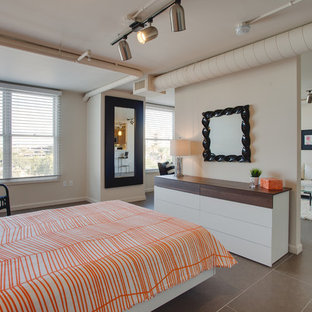 Diseño de dormitorio principal, actual, pequeño, sin chimenea, con paredes blancas, suelo de baldosas de porcelana y suelo gris