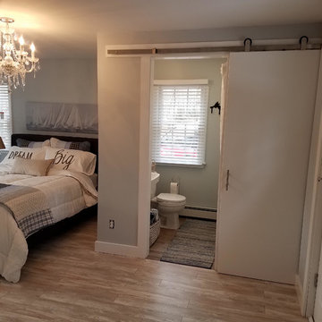 Floating Laminate Floor in Master Bedroom & Floating Vinyl Floor in Bathroom