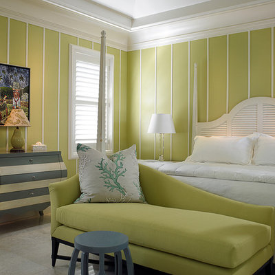 Example of an island style bedroom design in Toronto with green walls