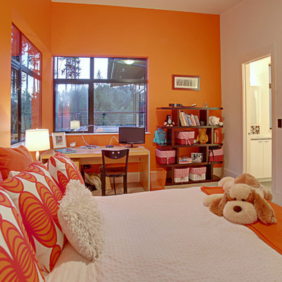 Inspiration for a contemporary bedroom remodel in Seattle with orange walls