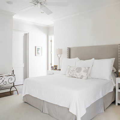 Inspiration for a large transitional master dark wood floor bedroom remodel in Miami with white walls and no fireplace