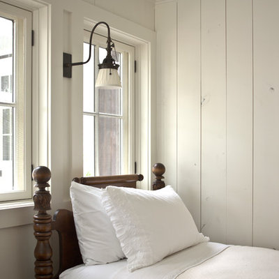 Example of a farmhouse bedroom design in Atlanta