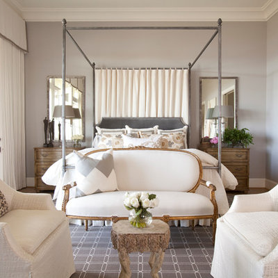 Example of a classic master bedroom design in Houston with gray walls and no fireplace