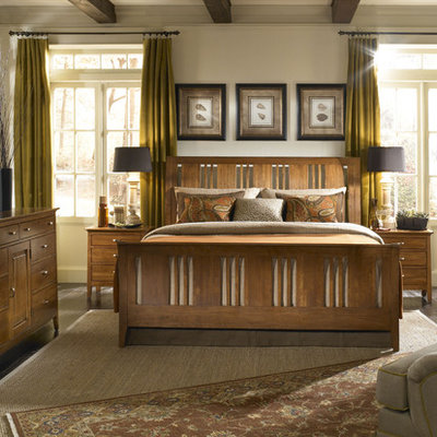 Trendy bedroom photo in Charlotte with a standard fireplace