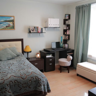 Ejemplo de dormitorio moderno, pequeño, con paredes grises y suelo de linóleo