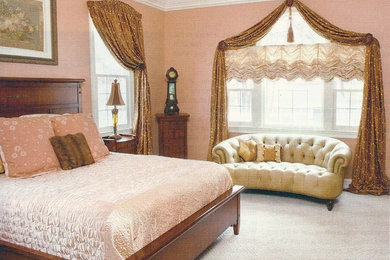 Inspiration for a large timeless carpeted bedroom remodel in Richmond with pink walls