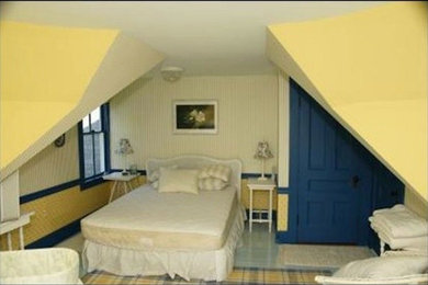 Bedroom - small guest bedroom idea in Other with yellow walls