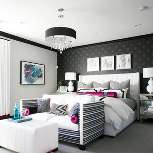 This is an example of a large traditional master bedroom in Orange County with grey walls, carpet and grey floors.