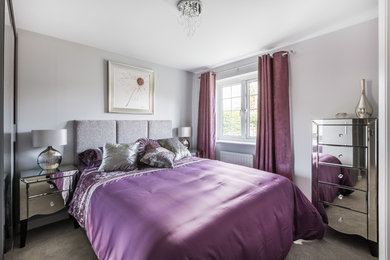 Design ideas for a contemporary bedroom in Sussex.