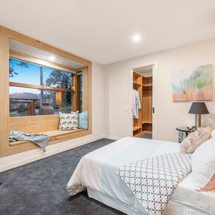 Design ideas for a scandinavian master bedroom in Melbourne with white walls, carpet and grey floor.