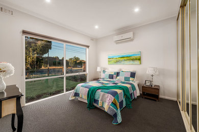 Contemporary bedroom in Melbourne.