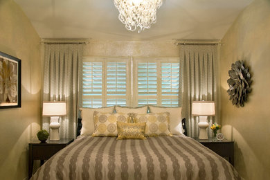 Inspiration for a mid-sized timeless master carpeted bedroom remodel in Austin with yellow walls