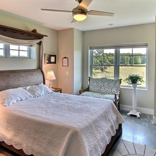 Design ideas for a mid-sized arts and crafts master bedroom in Grand Rapids with grey walls, ceramic floors and no fireplace.
