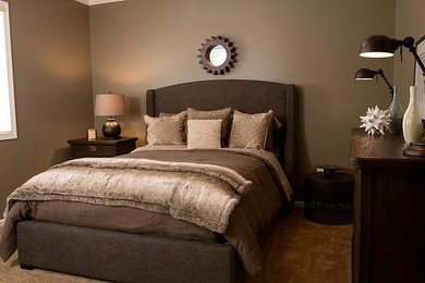 Example of a mid-sized classic master carpeted and beige floor bedroom design in Cleveland with brown walls