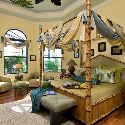 Island style bedroom photo in Miami with yellow walls