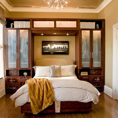 Inspiration for a contemporary guest medium tone wood floor bedroom remodel in San Francisco with beige walls