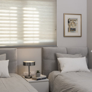 Guest bedroom in soft greys