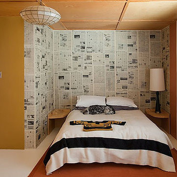 Guest bedroom newspaper wallpaper