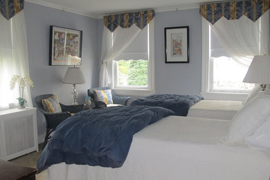 Mid-sized elegant guest carpeted and beige floor bedroom photo in New York with purple walls and no fireplace