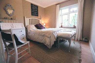 Photo of a small romantic bedroom in Other.