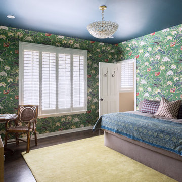 Guest Room with Colorful Wallpaper and Textiles