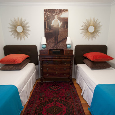 Bedroom - eclectic guest bedroom idea in Dallas with white walls