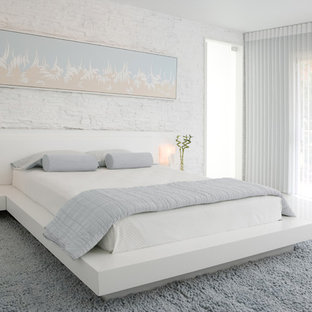 Inspiration for a contemporary white floor bedroom remodel in Atlanta with white walls