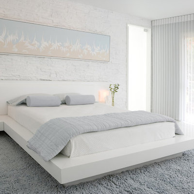 Inspiration for a contemporary white floor bedroom remodel in Atlanta with white walls